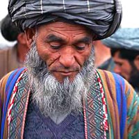 Elder Afghan gentleman, detail of photo by Scott Carrier
