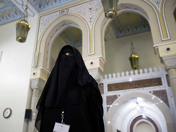 Woman in veil inside mosque