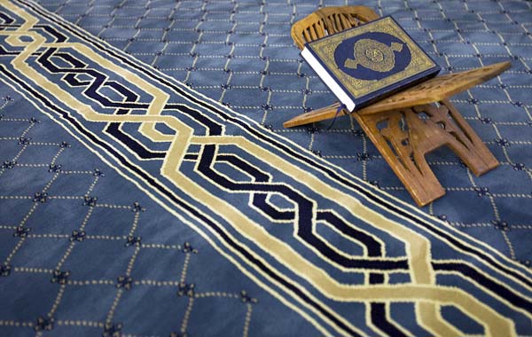 Koran on chair inside mosque.